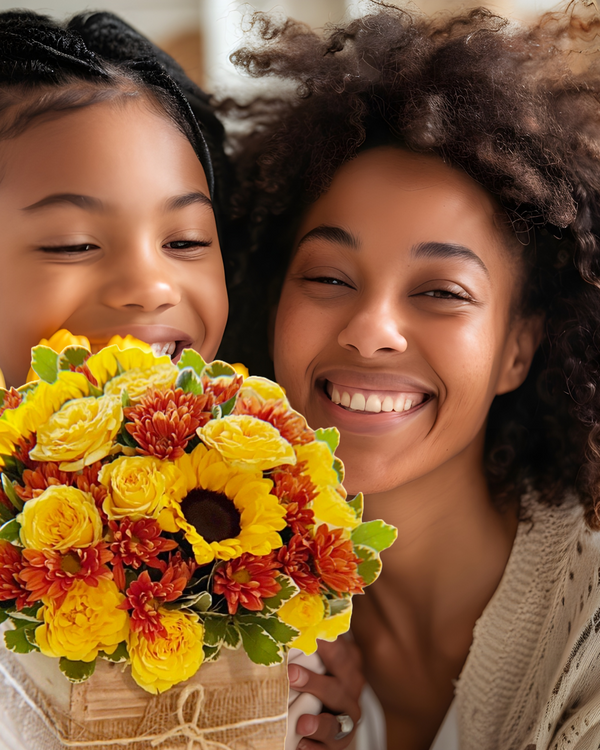 Premium fresh flowers in warm sunset tones, handcrafted for an elegant and timeless floral gift.