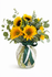 Sunny Surprise – Bright sunflower arrangement with fresh eucalyptus in a clear glass vase, perfect for birthday celebrations.